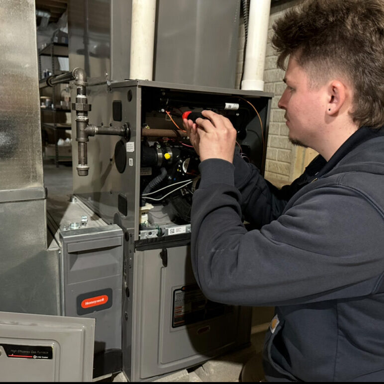 Forquer Heating Technician Providing Services